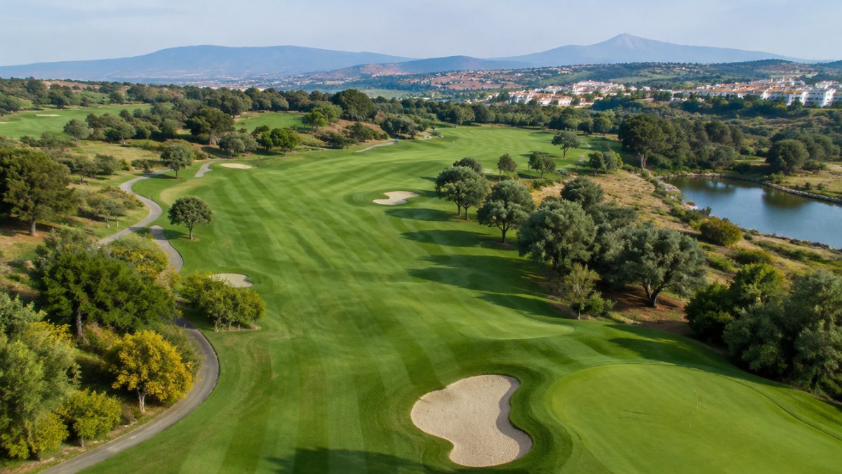 Aerial view of golf fairways with a well-defined mowing pattern